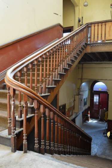 The wide main staircase was built with kauri timbers by William Bragg.
