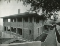 North elevation. C.M. Collins photographer. The upper balcony was glazed in 1941, and two gables added to the roof.